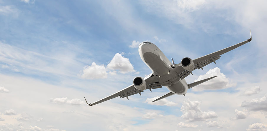 Delta airplane soaring in the sky.