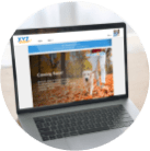 Laptop with the Elevate demo site.