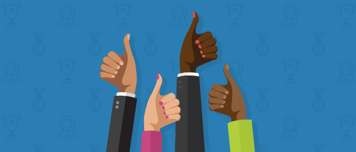 Group of people giving thumbs up, giving recognition