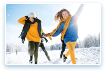 Friends having fun outdoors in winter