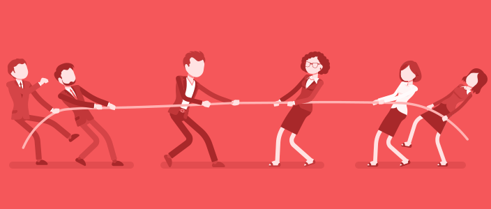 Office workers doing tug-of-war